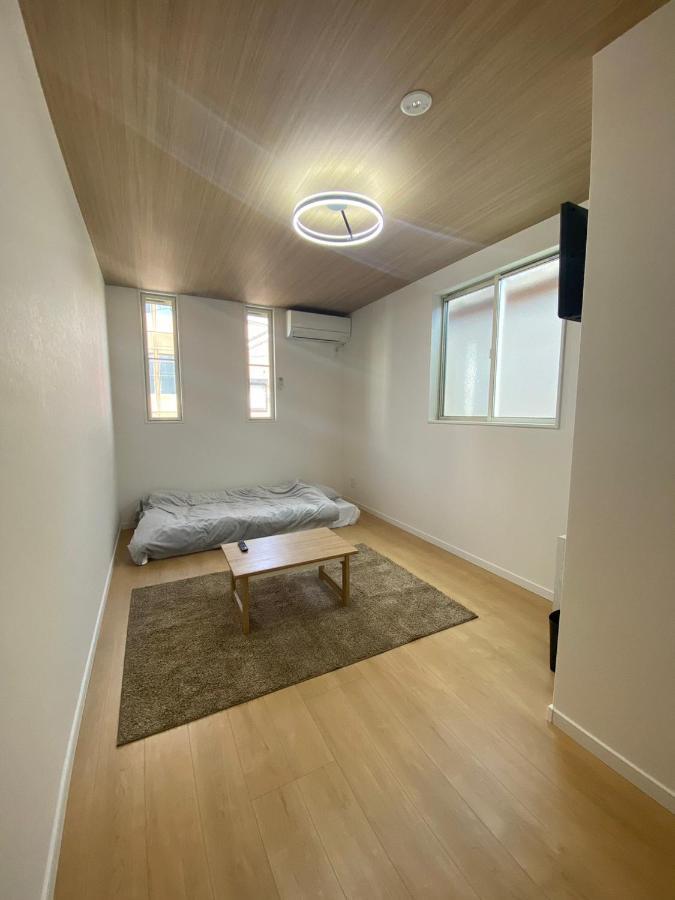 Guest House Daruma Anan Exterior foto